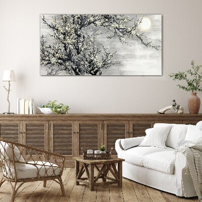 Glas foto Een bloeiende tak in monochrome tinten