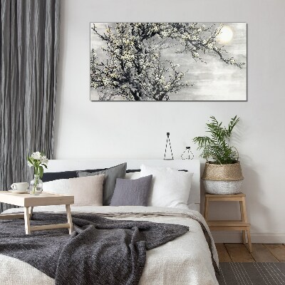 Glas foto Een bloeiende tak in monochrome tinten