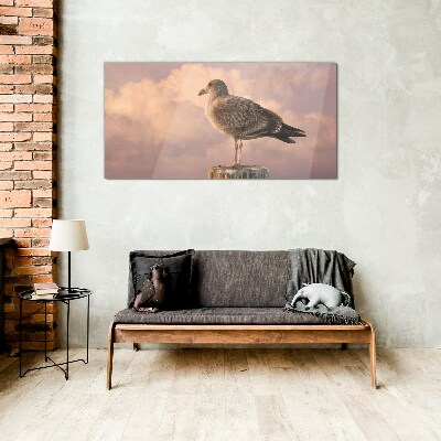 Foto op glas Gevleugelde beschermer in de wolken