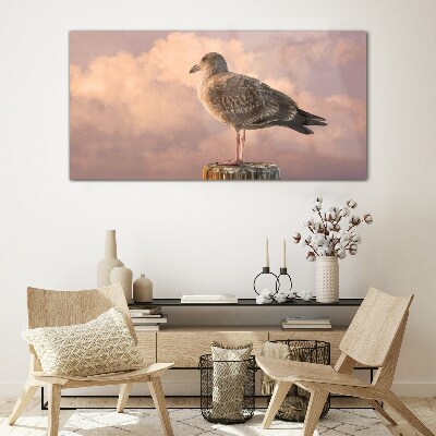 Foto op glas Gevleugelde beschermer in de wolken