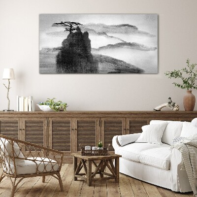 Foto op glas Een eenzame boom op een rotsachtige berg