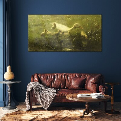 Foto op glas Een eend met kuikens in het gras