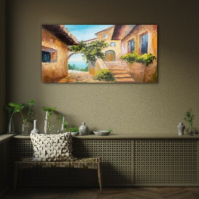 Foto op glas De charmante straatjes van het kustdorp