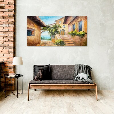 Foto op glas De charmante straatjes van het kustdorp