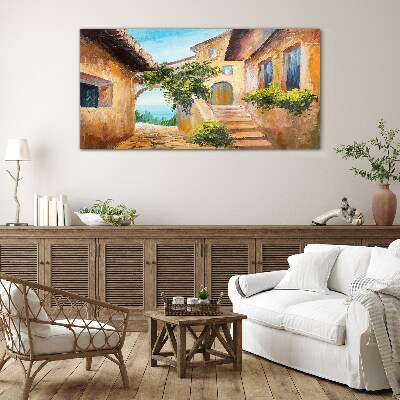 Foto op glas De charmante straatjes van het kustdorp