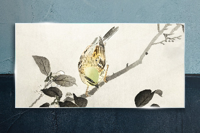 Foto op glas Gouden vogel op een tak