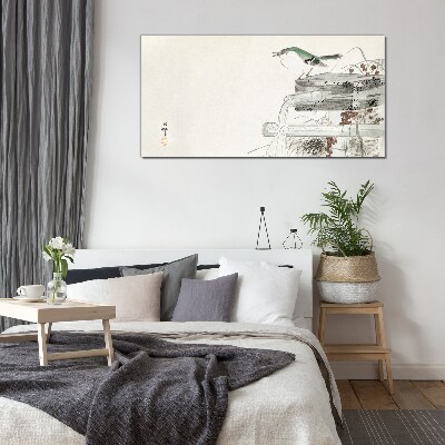 Foto op glas Een vogel tegen de achtergrond van een Japans landschap