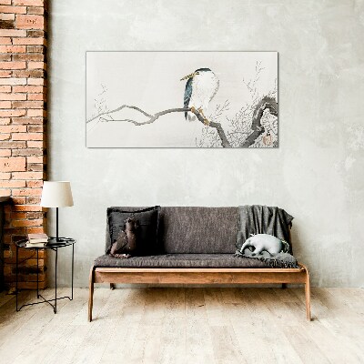 Schilderij op glas Een vogel op een tak in een delicaat landschap