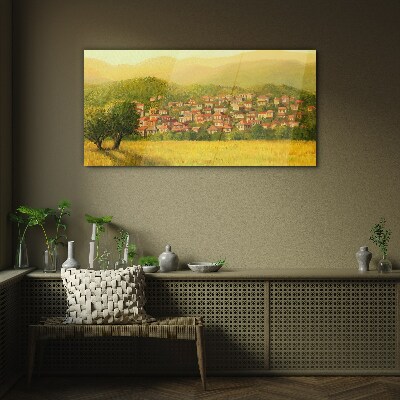 Foto op glas Een zonnig dorp tussen de heuvels