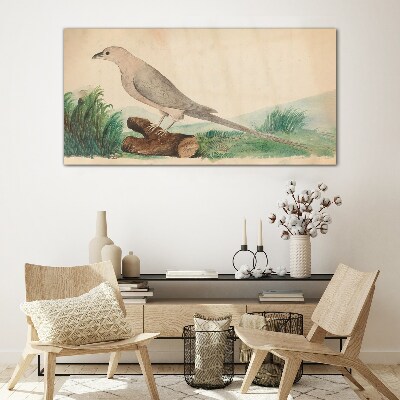 Foto op glas Een vogel tegen de achtergrond van de natuur