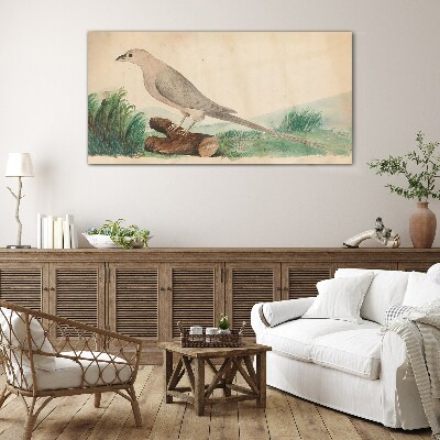 Foto op glas Een vogel tegen de achtergrond van de natuur