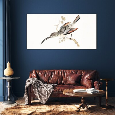 Foto op glas Een vogel op een tak