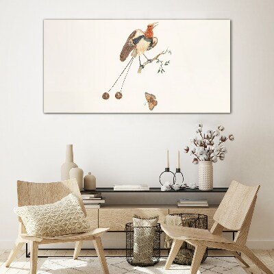 Schilderij op glas Een vogel op een tak met fruit