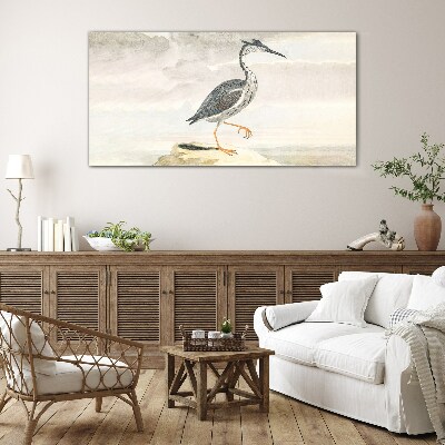 Foto op glas Een trekvogel tegen de achtergrond van de natuur