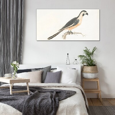 Foto op glas Een vogel op een tak