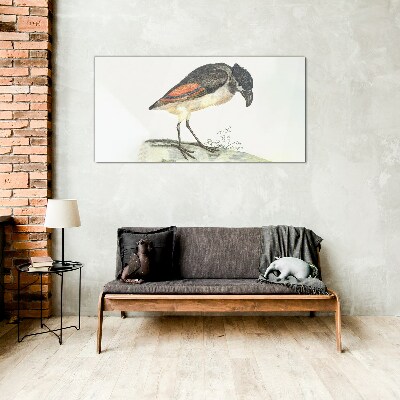 Foto op glas Een vogel tegen een natuurlijke achtergrond