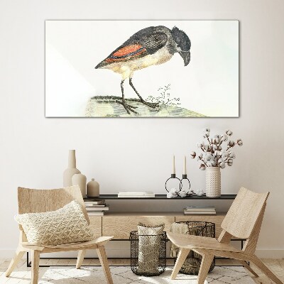 Foto op glas Een vogel tegen een natuurlijke achtergrond