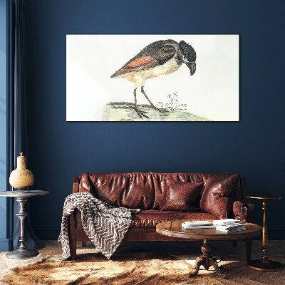 Foto op glas Een vogel tegen een natuurlijke achtergrond