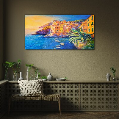 Foto op glas Een kleurrijk stadje aan zee