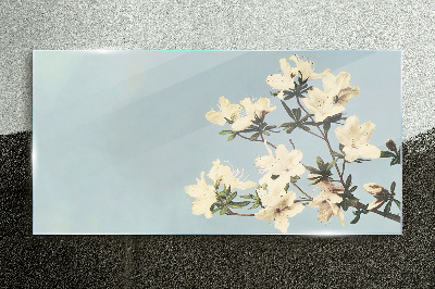 Foto op glas Bloemencompositie op een blauwe achtergrond