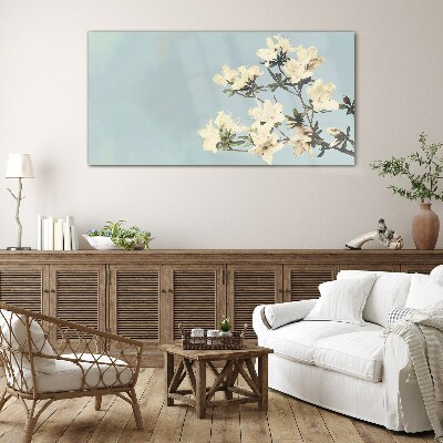 Foto op glas Bloemencompositie op een blauwe achtergrond