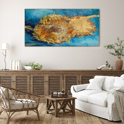 Schilderij op glas Zonnebloem op een blauwe achtergrond