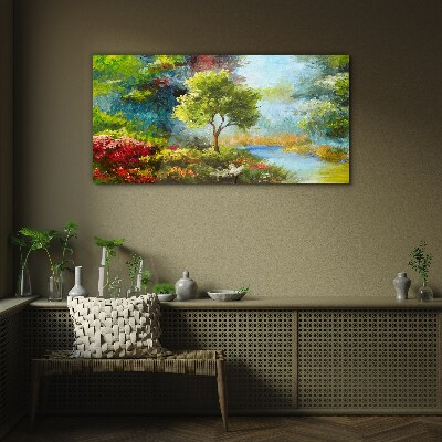 Schilderij op glas Lentelandschap met een boom en bloemen