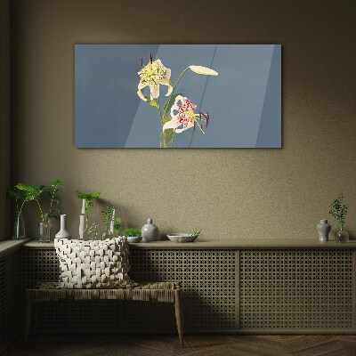 Foto op glas Bloemen op een blauwe achtergrond