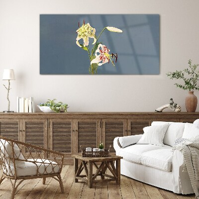 Foto op glas Bloemen op een blauwe achtergrond