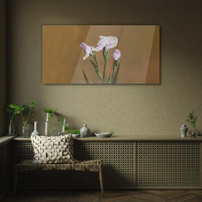 Glas foto Irisbloemen op een bruine achtergrond