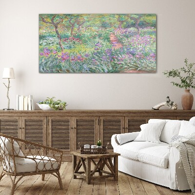 Schilderij op glas Bloementuin in de lentezon