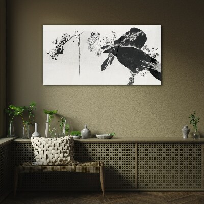 Foto op glas Een zwarte vogel tegen de achtergrond van de natuur