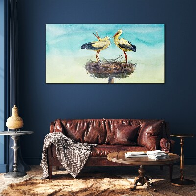 Glas foto Ooievaars op een nest in het blauw