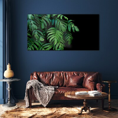 Glas foto Groene bladeren op een zwarte achtergrond