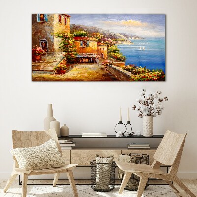 Schilderij op glas Een kustdorpje in de zon
