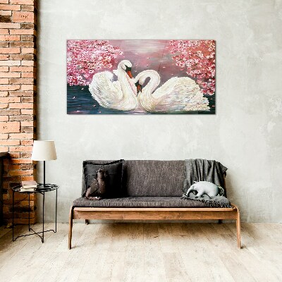 Foto op glas Zwanenliefde in een bloeiende boomgaard