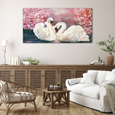 Foto op glas Zwanenliefde in een bloeiende boomgaard