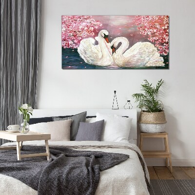 Foto op glas Zwanenliefde in een bloeiende boomgaard