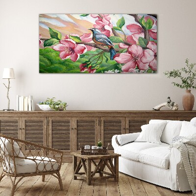 Glas foto Een vogel tegen een achtergrond van lentebloemen