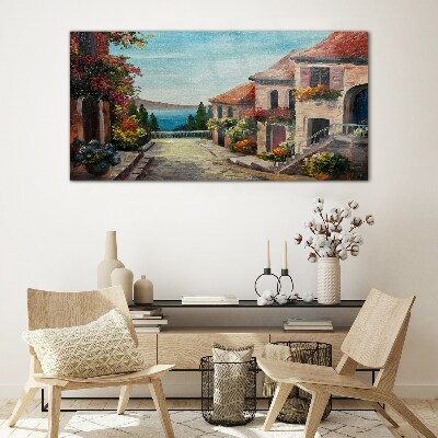 Schilderij op glas Een charmante straat aan zee