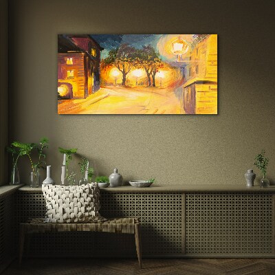 Schilderij op glas Een gouden avond in de stad