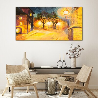 Schilderij op glas Een gouden avond in de stad