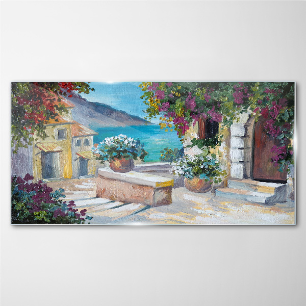 Foto op glas Een kustplaats in bloemen