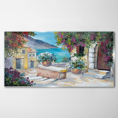 Foto op glas Een kustplaats in bloemen