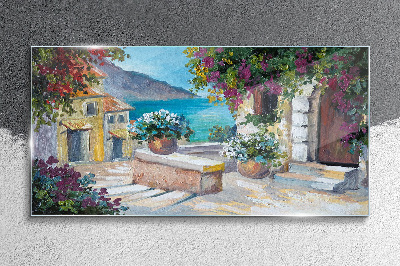 Foto op glas Een kustplaats in bloemen