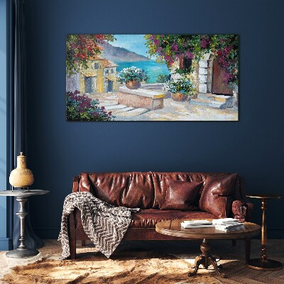 Foto op glas Een kustplaats in bloemen