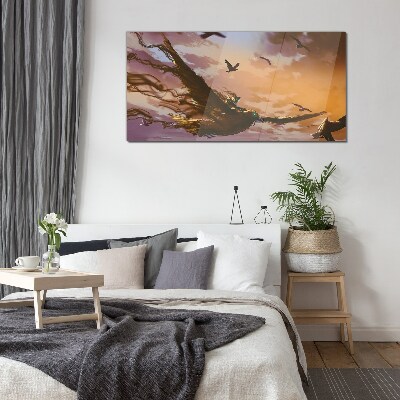 Glas foto Vlucht van vogels in de ondergaande zon