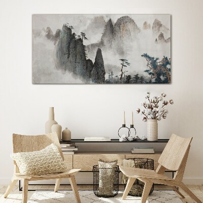 Foto op glas Berglandschap in een mistig landschap