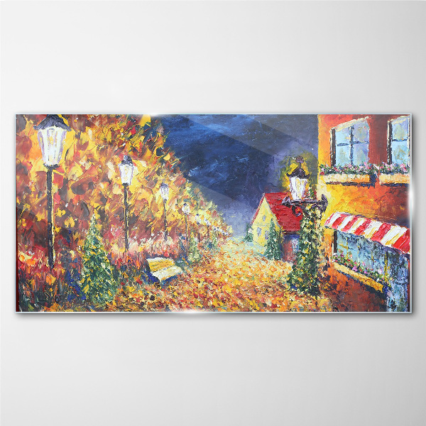 Foto op glas Gouden laan in het schijnsel van lantaarns