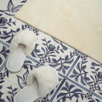 Vinyl wandbekleding Vogel tussen plantenmotief